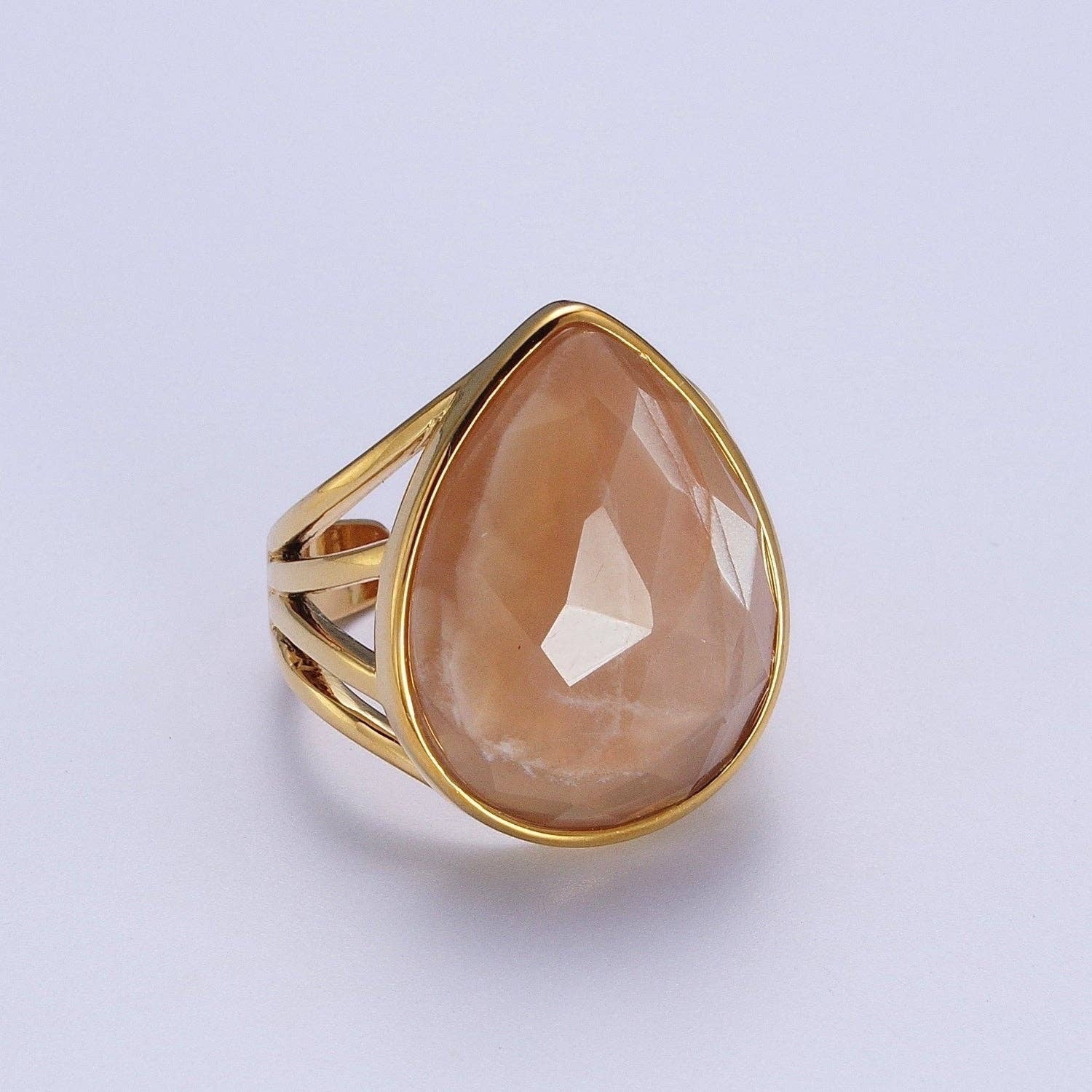Gold Filled Multifaceted Teardrop Gemstone Ring Sunstone. Our Gold Filled Multifaceted Teardrop Gemstone Ring from brass and gold-filled materials, this Single Stone/Solitaire Ring is a testament to our dedication to unique design.