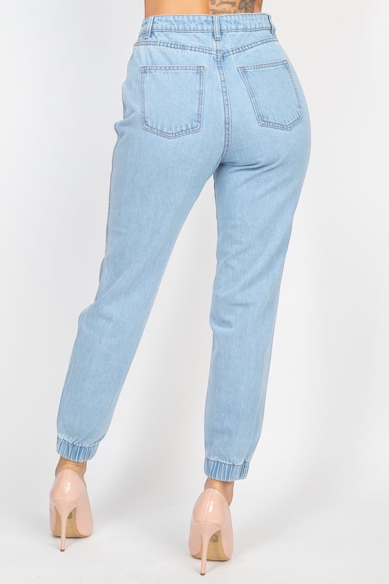 Elastic Cuffed Sweatpants Jeans are here to flip the script. Crafted from 100% cotton, they're the rebellious love child of your favorite sweatpants and classic denim, complete with a high waist, front pleats, and slanted side pockets that actually work.
