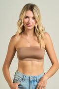 Experience ultimate comfort and versatile style with our Seamless Bandeau Top. Crafted from a soft, stretchy fabric, this bandeau top offers a smooth, second-skin feel that moves with you throughout the day.