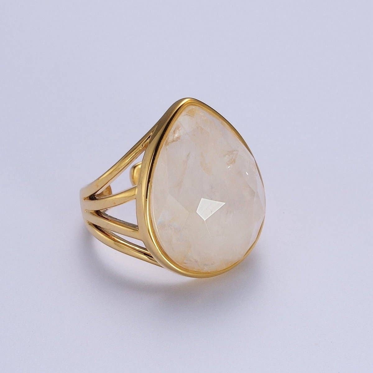 Gold Filled Multifaceted Teardrop Gemstone Ring Clear Quartz.Our Gold Filled Multifaceted Teardrop Gemstone Ring from brass and gold-filled materials, this Single Stone/Solitaire Ring is a testament to our dedication to unique design.