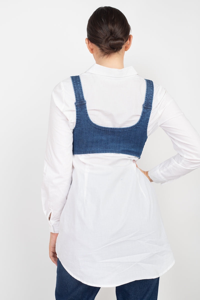 Luxe Life Styled blue denim vest top with adjustable straps and scoop back, layered over a white button-up shirt.
